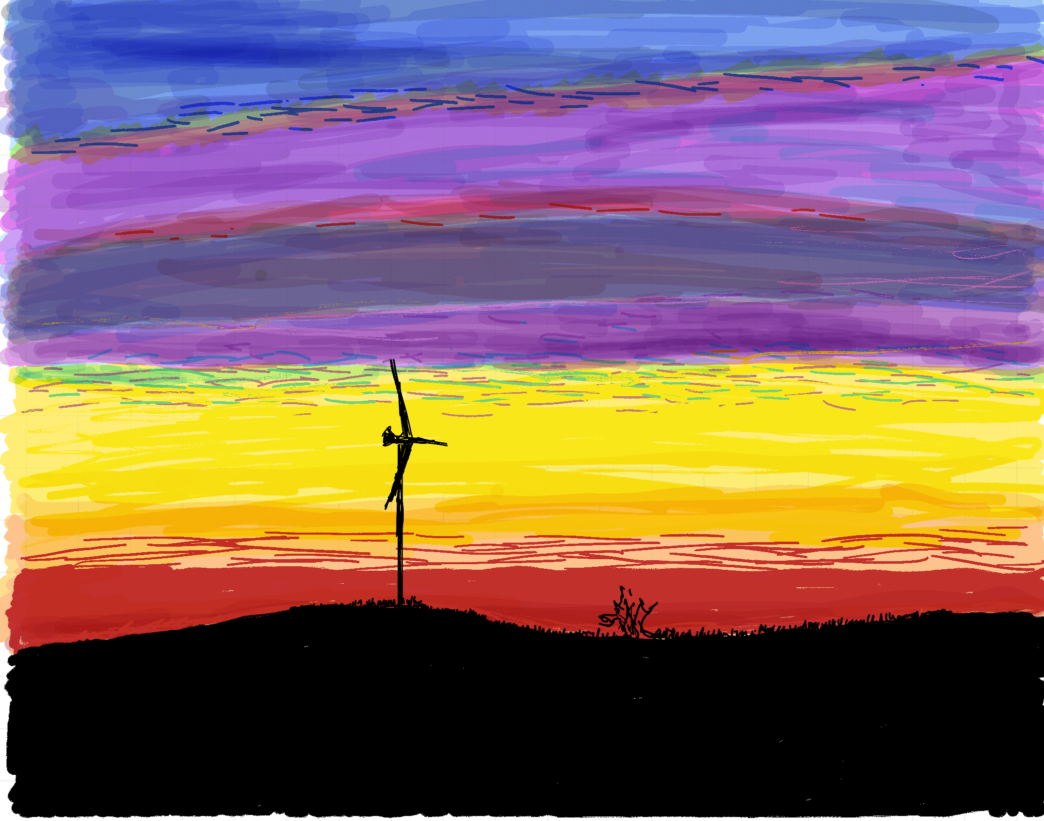 Sunset behind wind turbine